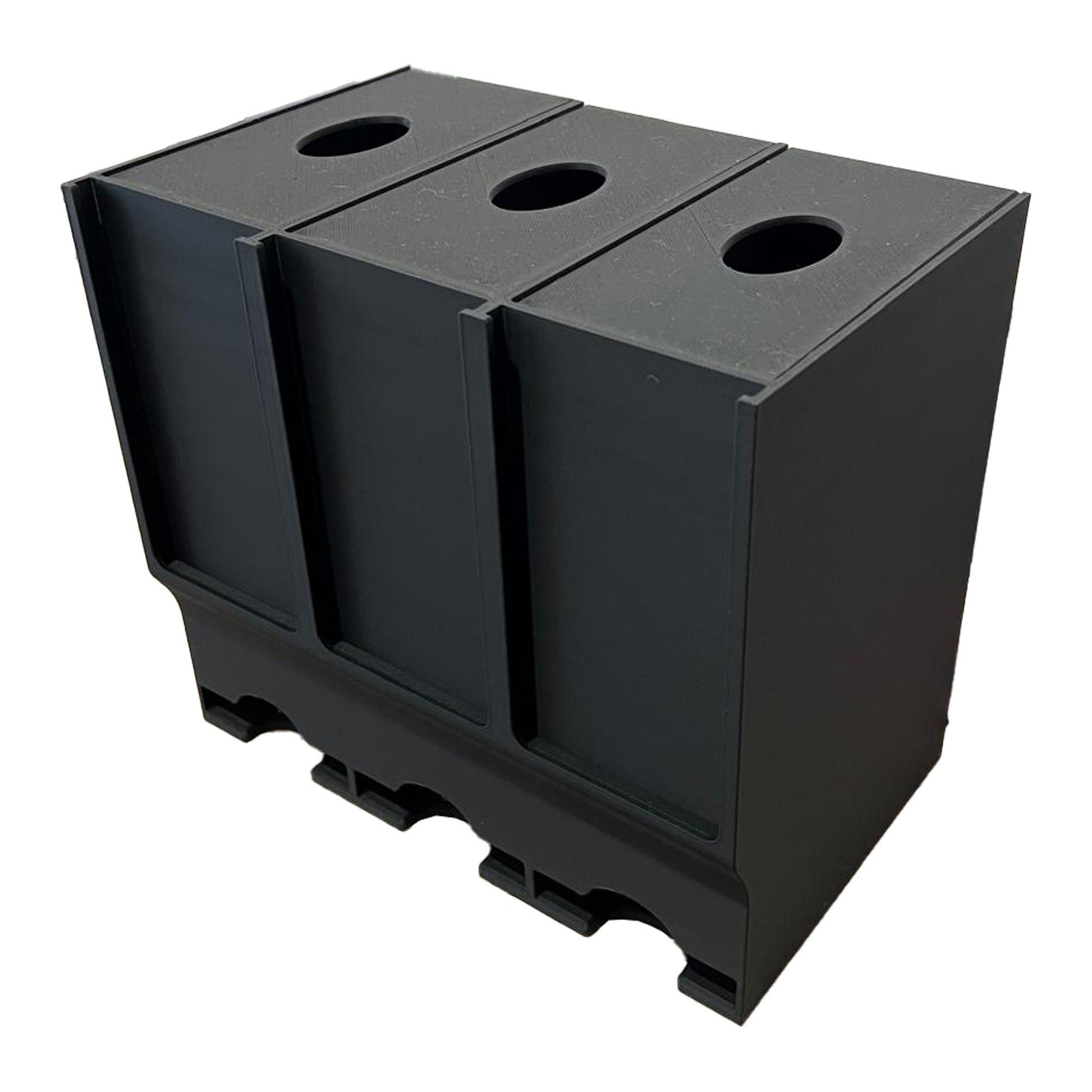 Triple slot Pokémon card dispenser with three Pokémon packs displayed. The dispenser is made from sturdy black material and provides ample space for storing multiple packs.