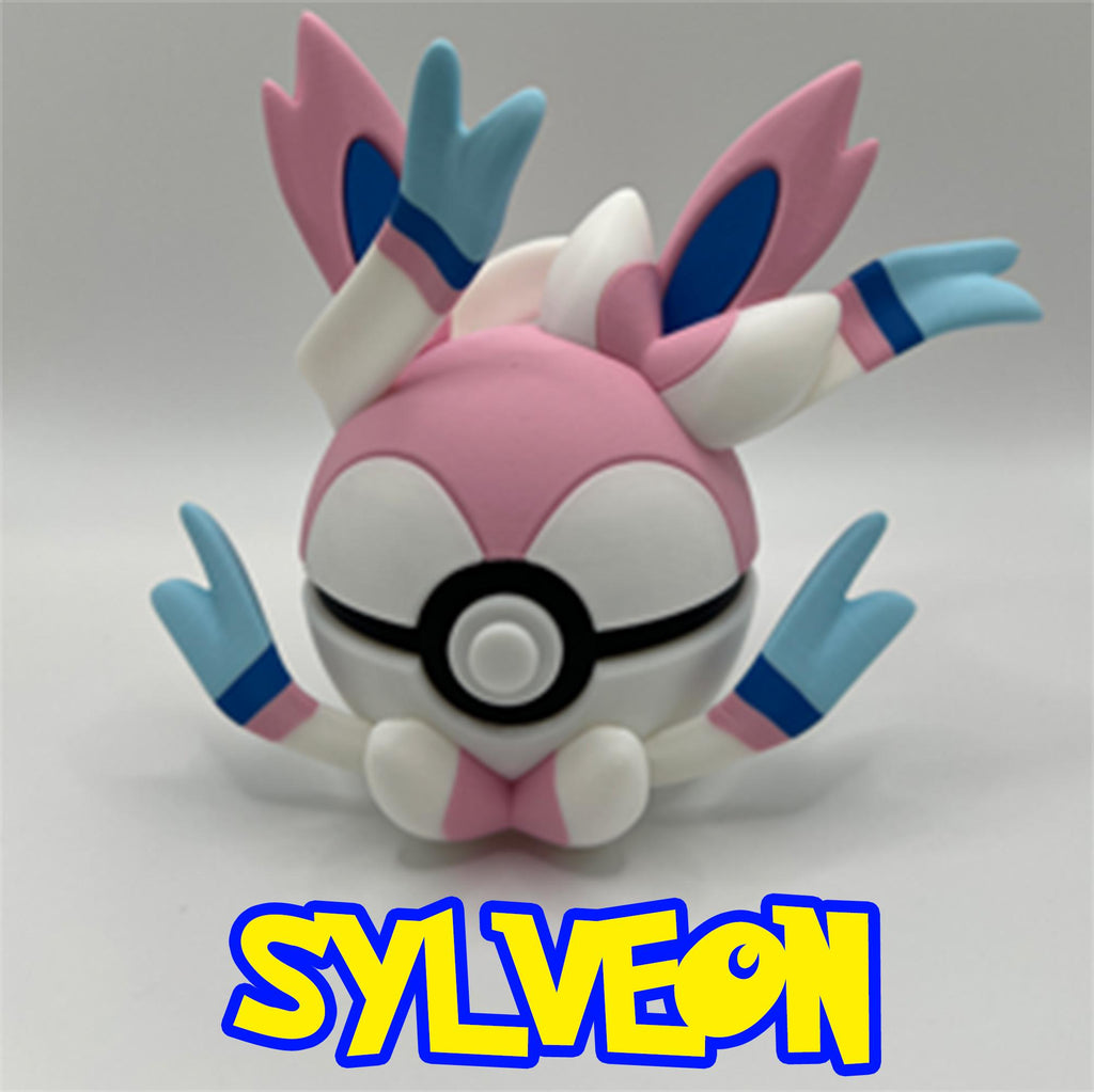 Adorable Sylveon Pokéball with pink-and-white ribbon ears, blue eyes, and charming 3D features.